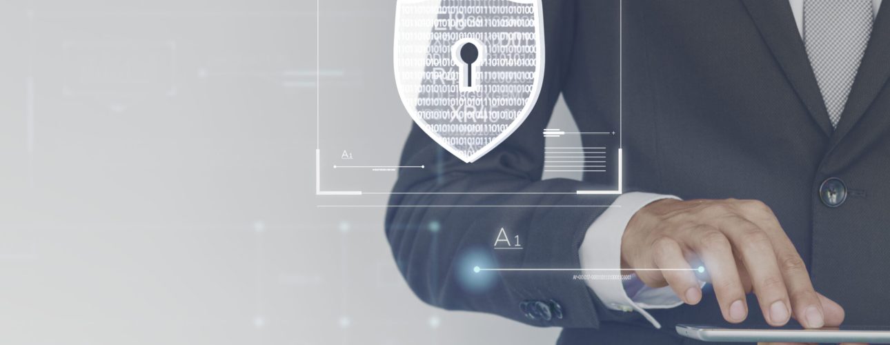 Businessman logging in to his tablet