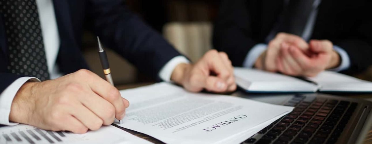 businessman-reading-contract-closeup_1098-14742[1]