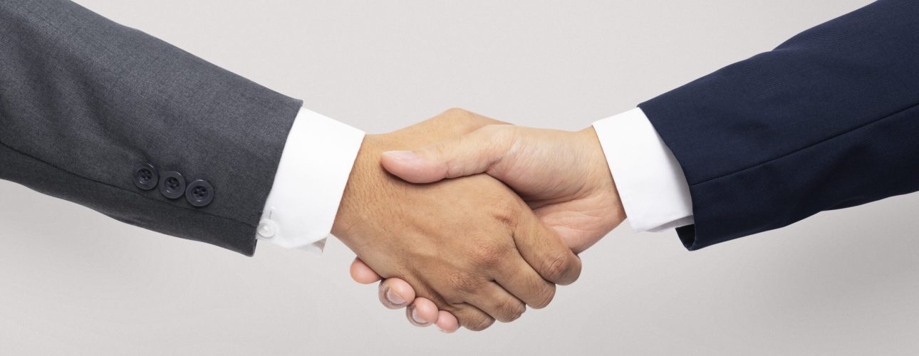 Business agreement handshake hand gesture